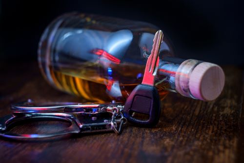 Alcohol bottle and car keys
