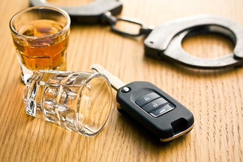 Whiskey, Car Keys, and Handcuffs