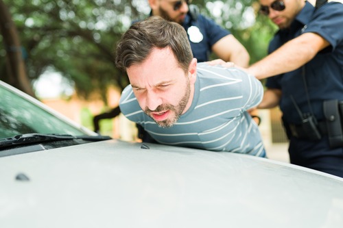 Man being arrested for DUI. DUI conviction.